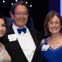 Jim and Donna Brooks and guest in the ballroom